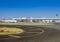 NAIA Terminal 2 airport in Manila, Philippines. View of runway, tarmac and a few airplanes