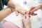 Nail cuticle cutting - manicure process in beauty salon