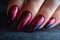 Nail design on shiny nail polish, fashionable red and black manicure, AI Generated
