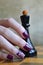 Nail designs: dark plum gloss and Matt flower