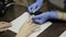 Nail filing and hand care. Woman hands receiving a manicure in beauty salon.