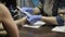 Nail filing and hand care. Woman hands receiving a manicure in beauty salon.