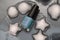 Nail polish bottle and ice with sea shells form