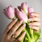 Nail Polish.  Modern style pink Nail Polish.Stylish pastel Color white milk Nails hold. Classic wedding bride nails design.