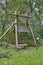 Nailed wooden swing made Ð²Ð‚â€¹Ð²Ð‚â€¹of logs