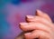 Nails Design. Hands With Bright Nude Manicure On Colorful Background. Close Up Of Female Hands. Art Nail