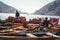 Nainital, Uttrakhand, India- June 24 2020: two boatmen sitting on colorful boats on the shore of Nainital in Uttrakhand