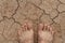 Naked feet on dry land