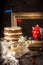 Naked Layer Cake , teapot, vintage tableware and books on wooden table.