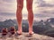 Naked male legs with horrible blister on peak. Injured rock climber heel