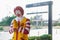 Nakhon Sawan, THAILAND - Mar 01, 2019: Mascot of McDonald`s Restaurant, Ronald McDonald standing in front of McDonald`s drive th