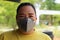 Nakhon Sawan, Thailand, May 6, 2019, Asian women  Wear a mask to prevent dust and smoke due to dusty weather, pollution exceeding