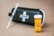 Naloxone kit and syringe front of seamless plain background