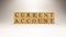The name Current Account was created from wooden letter cubes.