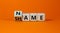 Name or shame symbol. Turned the cube and changed cube and changes the word `shame` to `name` or vice versa. Beautiful orange