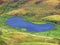 Nameless small alpine lakes and natural mini ponds on the mountain plateaus in the Uri Alps mountain massif, Kerns - Switzerland