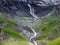 Nameless waterfalls under the Alpine peaks Glarner Vorab and BÃ¼nder Vorab in the valley of Im Loch