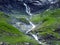Nameless waterfalls under the Alpine peaks Glarner Vorab and BÃ¼nder Vorab in the valley of Im Loch