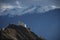 Namgyal Tsemo Gompa from behind and snow mountain range background Leh, Ladakh, India.