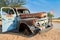 Namibia. Classic car wreck decaying in the desert