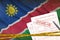Namibia flag and Health insurance claim form with covid-19 stamp. Coronavirus or 2019-nCov virus concept