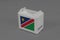 Namibia flag on white box with barcode and the color of nation flag on grey background. The concept of export trading from Namibia