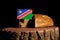 Namibian flag on a stump with bread