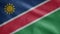 Namibian flag waving in the wind. Close up of Namibia banner blowing soft silk