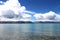 Namtso lake with distant mountains and blue sky in Tibet, China