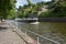 Namur, Belgium. View on the Sambre river with ship near the historic citadel.