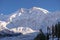 Nanga Parbat covered with white snow and evening sunlight up