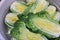 Napa cabbage or chinese leaves cut in half on display in bowl of water