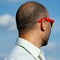 Nape of a mature balding man against the sky.