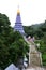 Naphamethinidon chedi and Naphaphonphumisiri pagoda stupa of Doi Inthanon mountain with mist rainning in morning for thai people