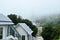 Naphamethinidon chedi and Naphaphonphumisiri pagoda stupa of Doi Inthanon mountain with mist rainning in morning for thai people