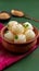 Napkin delight Rasgulla, a famous Bengali sweet in a clay bowl