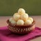 Napkin delight Rasgulla, a famous Bengali sweet in a clay bowl