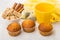 Napkin, muffins, teacup, bowl with cinnamon and sugar, tea bags