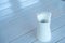 Napkin orderly manner fold in glass setting on dining table for