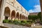 Naples, Italy - October 25, 2019: View of the decorated by frescoes cloister arcades of The Monumental Complex of Saint Claire in