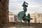 NAPLES, ITALY - OCTOBER 31, 2015: Bronze sculpture of a rooster in the medieval castle Castel dell Ovo. The castle is the oldest