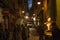 NAPLES, ITALY - OCTOBER 31, 2015: Unknown people on the one of the old shabby narrow streets in the historical part