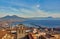 Naples, Italy: Panoramic view of the city and port with Mount Vesuvius on the horizon as seen from the hills of Posilipo