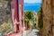 Naples, Italy. View of a glimpse of the Gulf of Naples through the characteristic houses of the Petraio Steps.