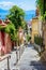 Naples, Italy. View of a glimpse of the Gulf of Naples through the characteristic houses of the Petraio Steps.