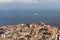 Naples and Mediterranean sea with white boat and ferry top view. Naples seashore on sunset. Travel concept.