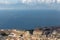 Naples and Mediterranean sea with white boat and ferry top view. Naples seashore on sunset. Travel concept.