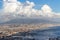 Naples and port of Mediterranean sea and volcano Vesuvius top view. Naples cityscape. Volcano Vesuvius in clouds.