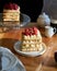 Napoleon cake with raspberries and coffee.