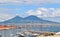 Napoli old Italian town volcano Vesuvius panorama blue sky sea boats background